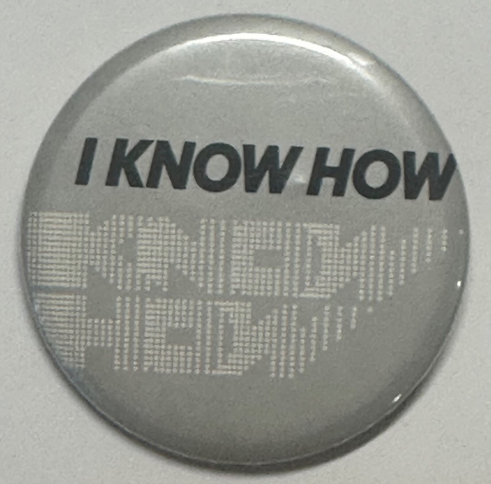 “I KNOW HOW” Bold Modernist Statement Button – Gray with Pixel Art Text