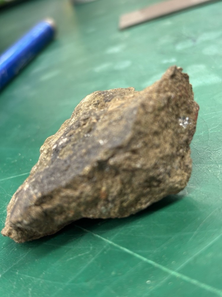 as gold ore on green stone