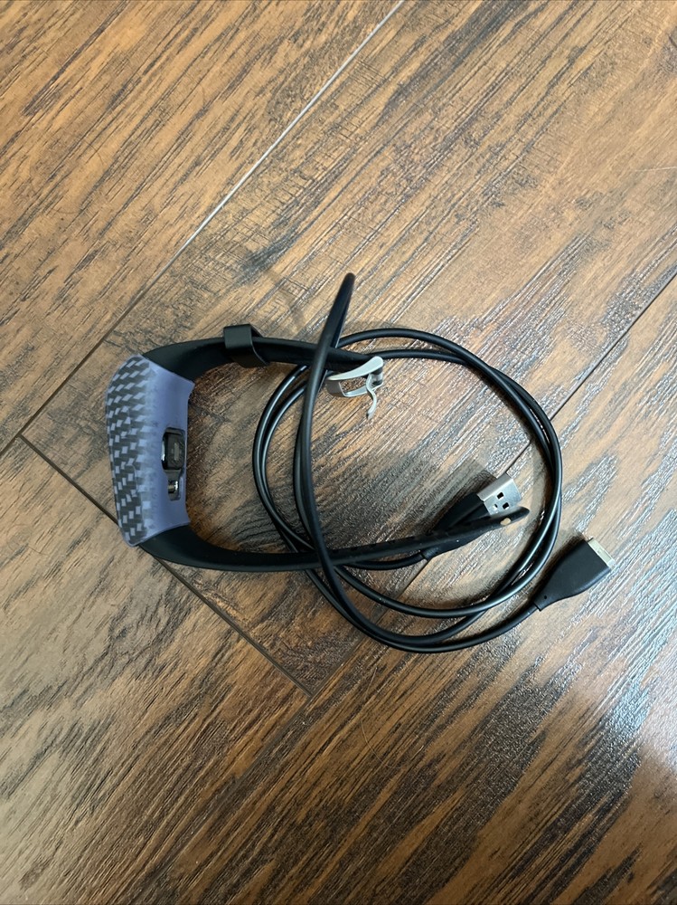 Fitbit Surge Wristband Activity Tracker Doesn’t Hold A Charge. With Charger