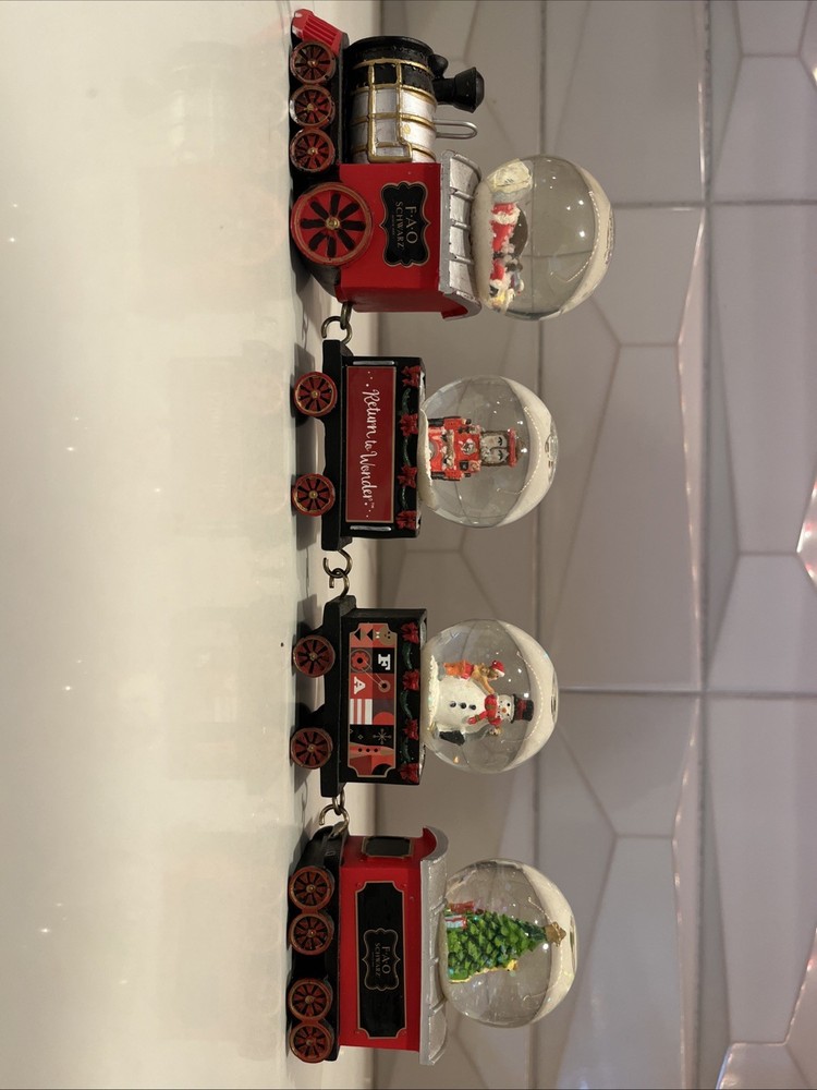 F.A.O SCHWARZ 4- piece Train Snow Globe Set