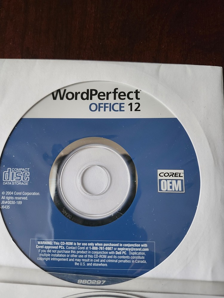 assorted computer installation and program discs