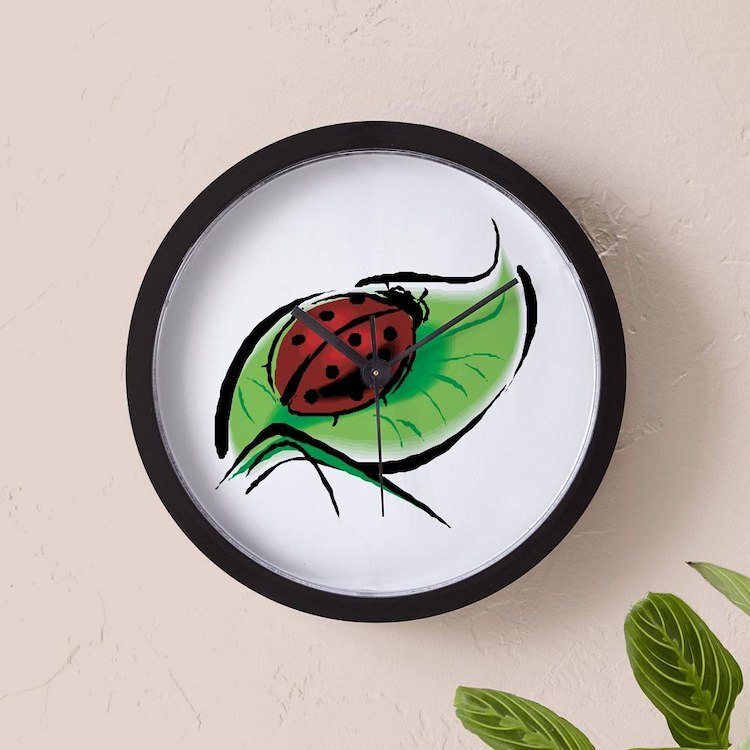 CafePress Ladybug On A Leaf 10" Wall Clock (154329408)