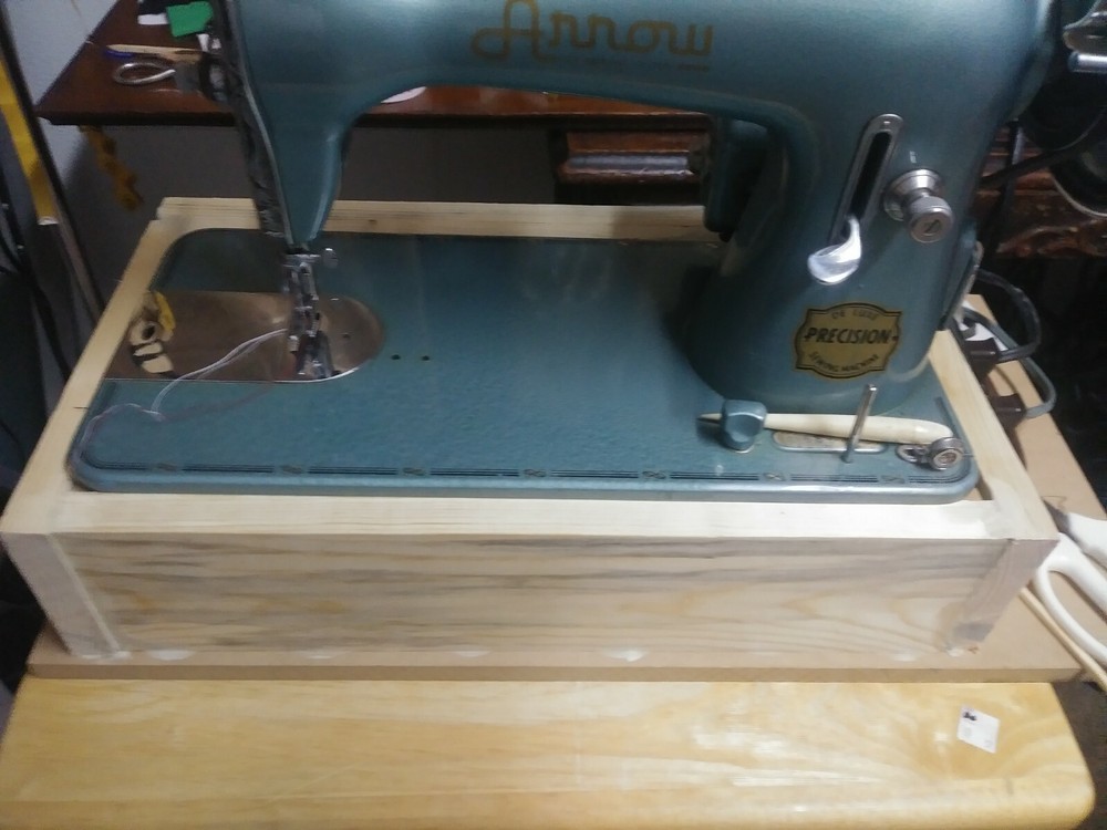 bottom base for sewing machines 