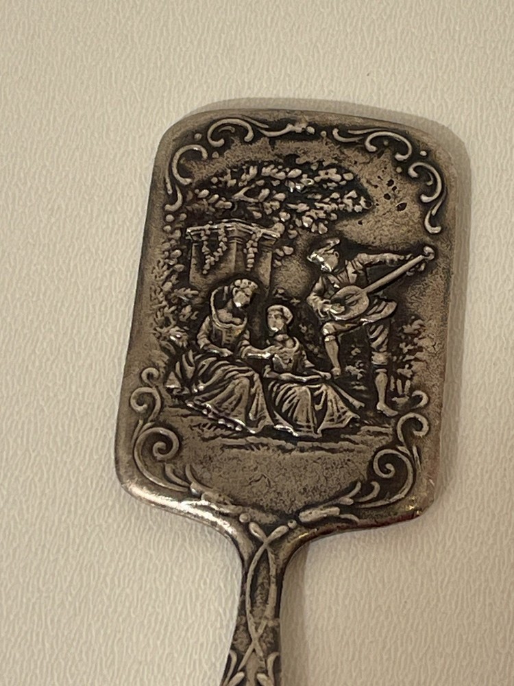 Small cast metal vintage vanity mirror