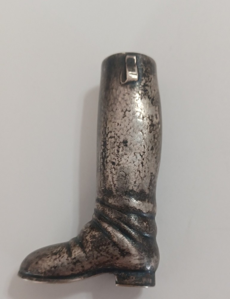 Sterling. 925 boot shaped handle.