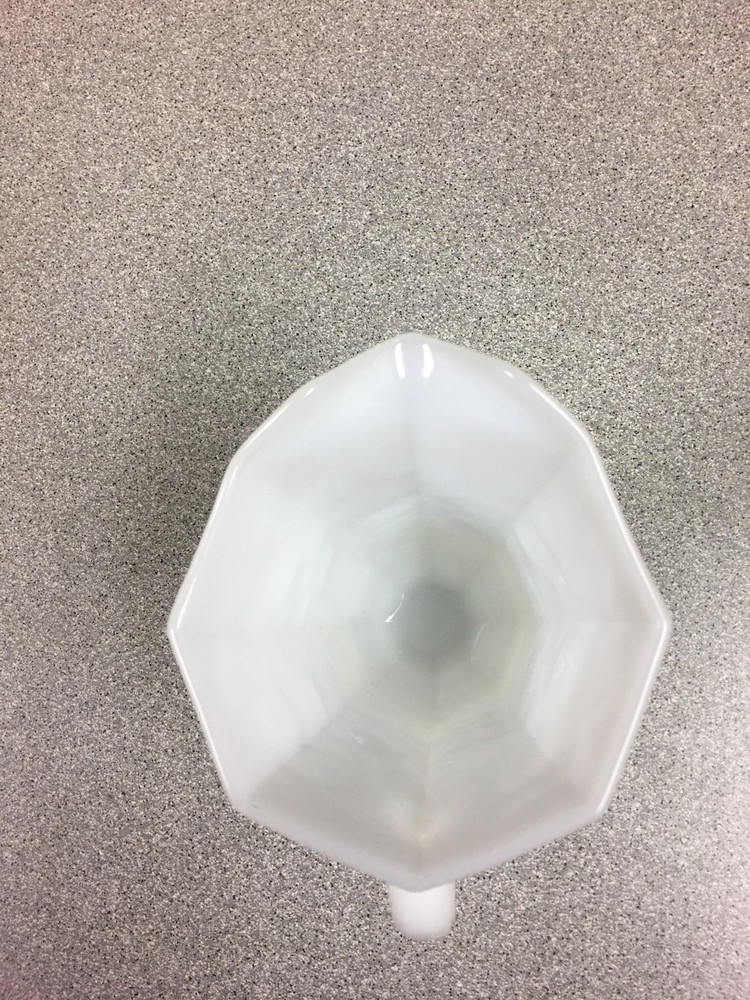 Milk Glass Pitcher. Translucent.