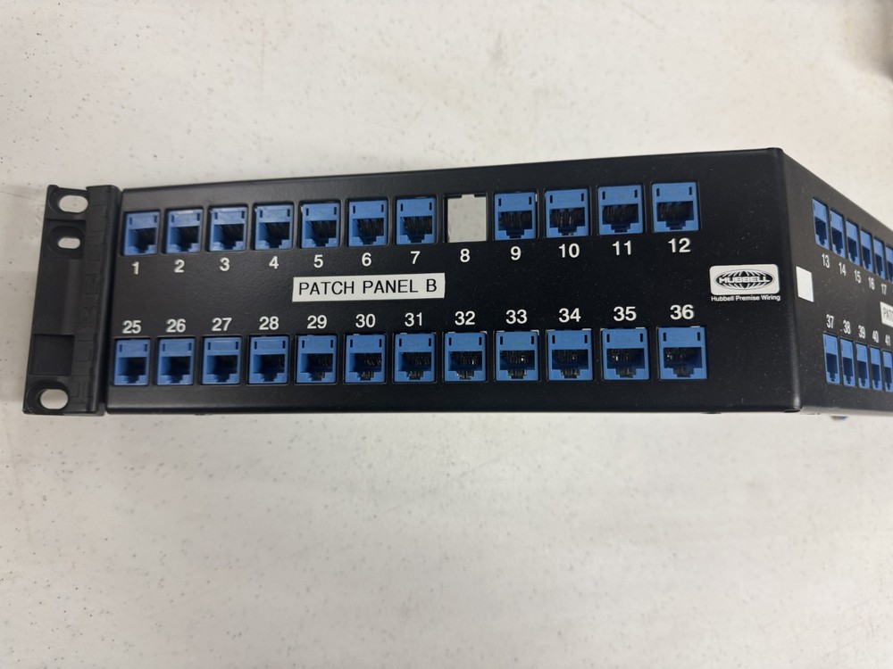 USED HUBBELL UDXA48 48 PORT ANGLED PATCH PANEL LOADED WITH CAT 5e JACKS!