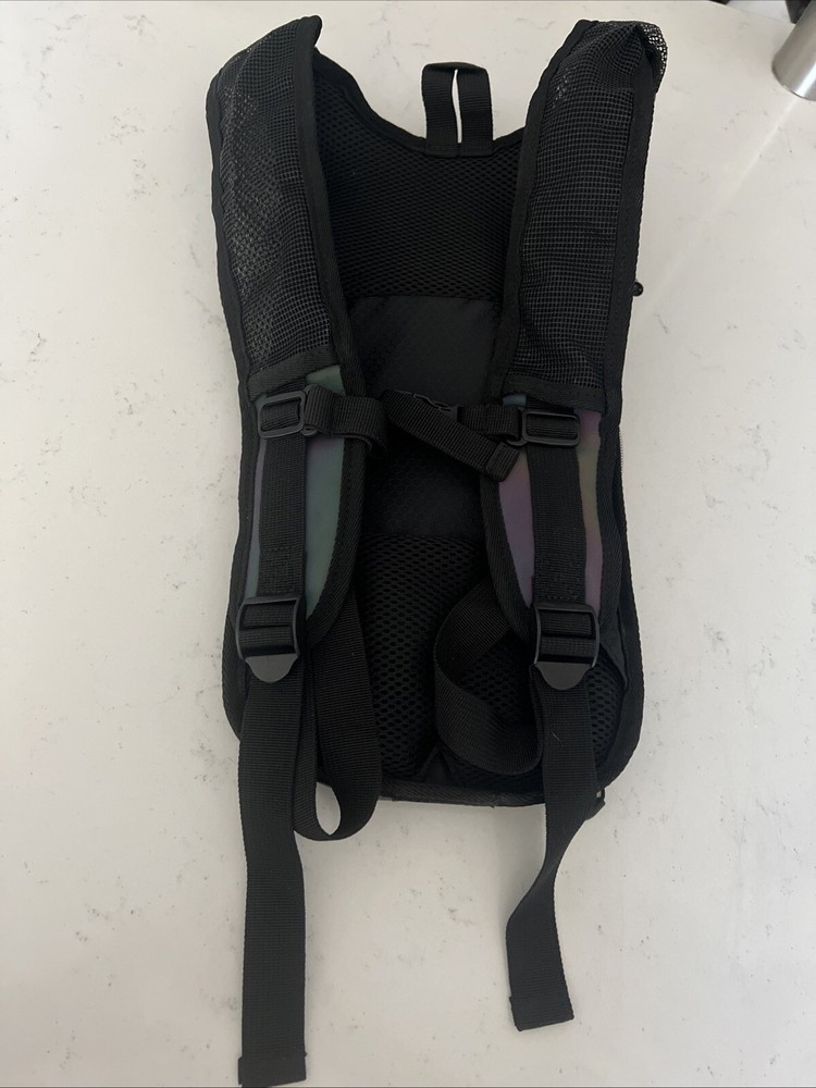 Sojourner Hydration Backpack No Bladder* Metallic Finish Two Zipper Pockets