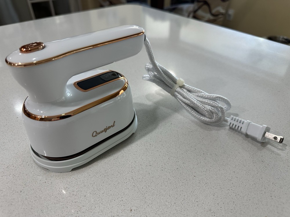 Handheld Steaming And Ironing Machine.