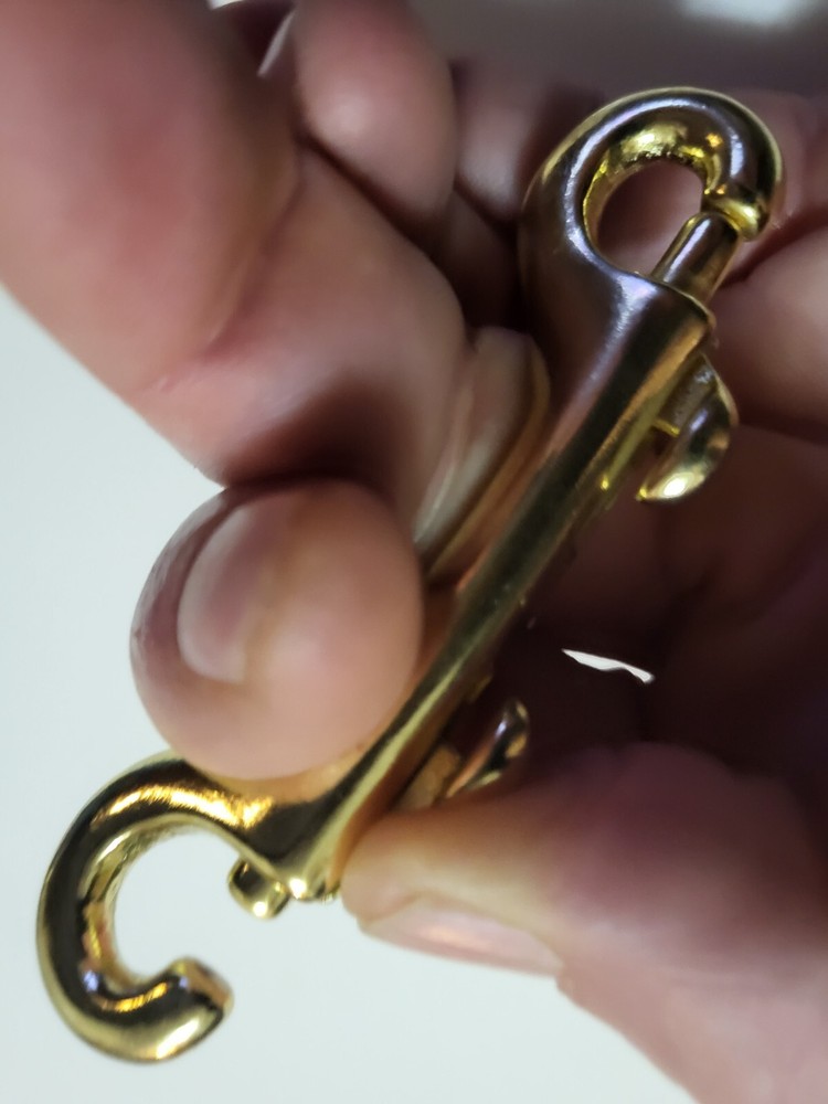 3 1/2" solid brass double sided snap hook. thumb release. leash lanyard