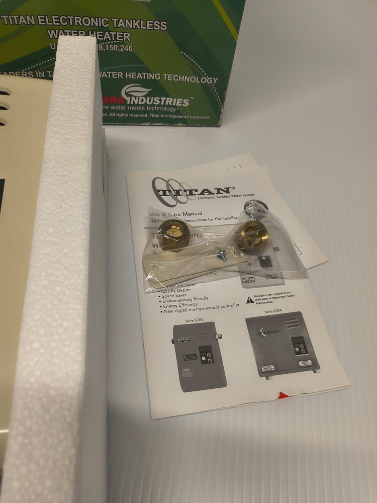 Titan Electronic Tankless Water Heater Model N-64 VOLTS 277 AMPS 25 OPEN BOX