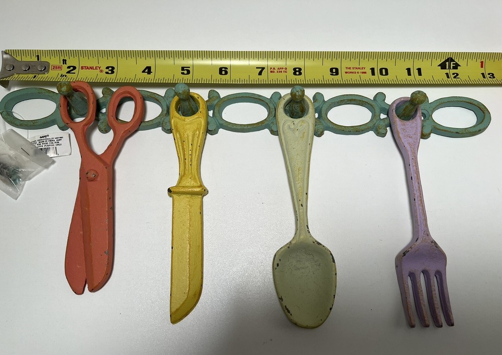 Cast iron kitchen decor with hanger