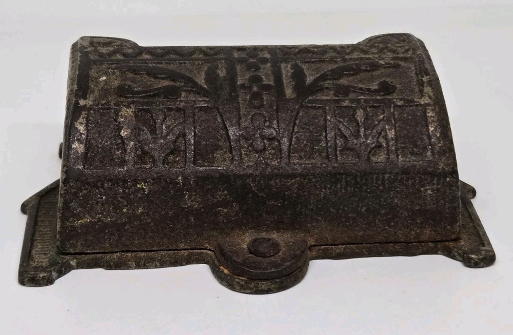 VINTAGE CAST IRON MATCH STRIKER