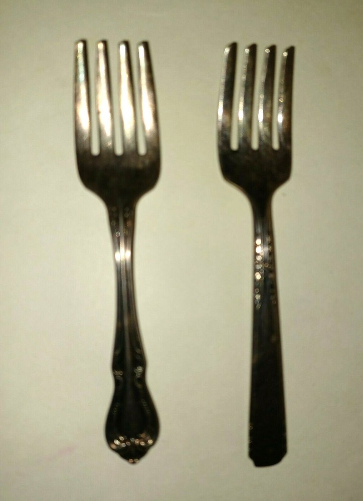 Pair miniature forks not matching 4" tarnished