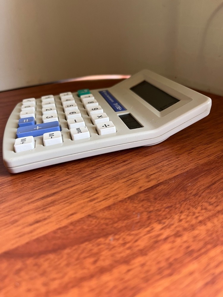 TEXAS INSTRUMENTS TI-1795+ Handheld Calculator Solar Powered