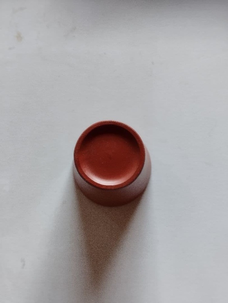 Reddish-brown ceramic sake bottle and 4-piece choko set