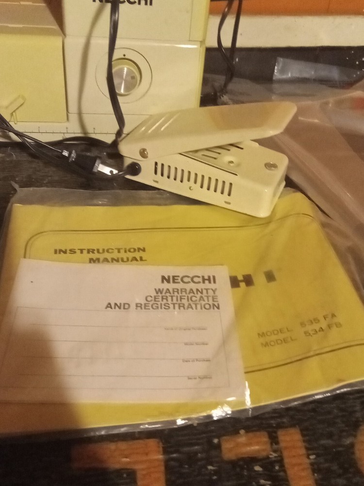 Necchi Model 535FA Sewing Machine with box, petal, and accessories