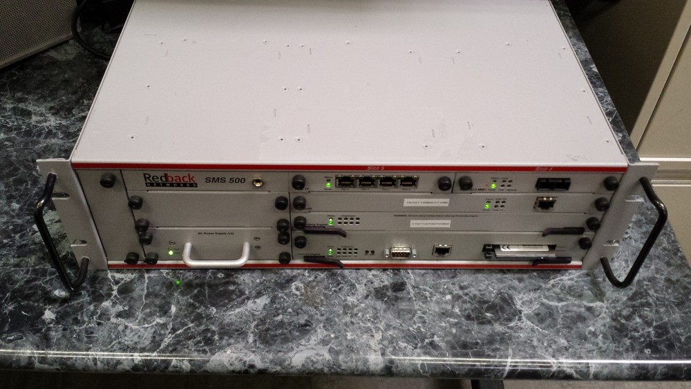 Redback Networks SMS 500 W/ ATM-1, ETHERNET, FORWARDING ENGINE, CONTROL ENGINE,