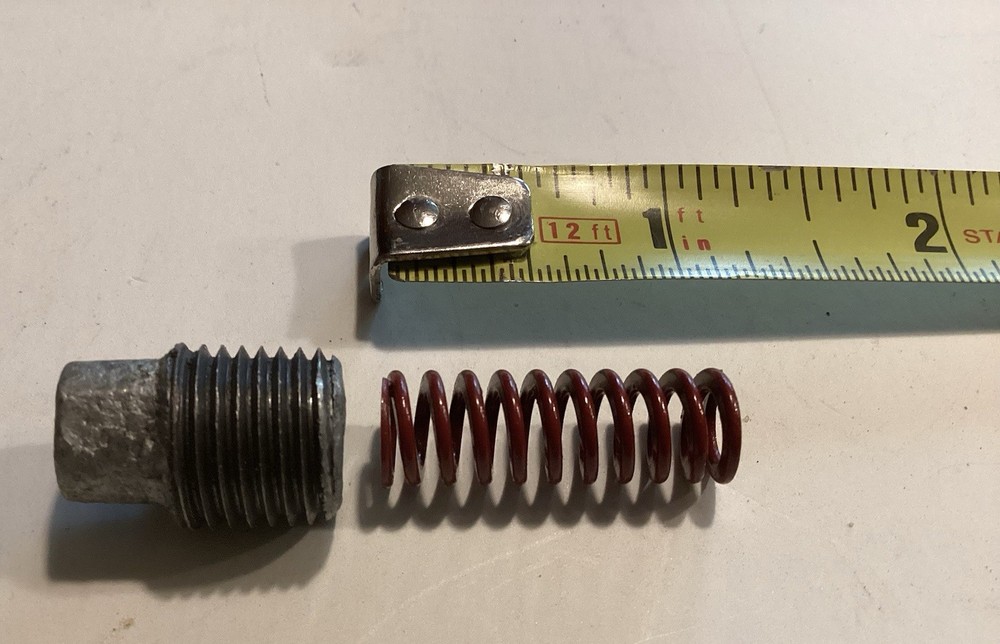 Troy Bilt Horse depth regulator spring and plug.