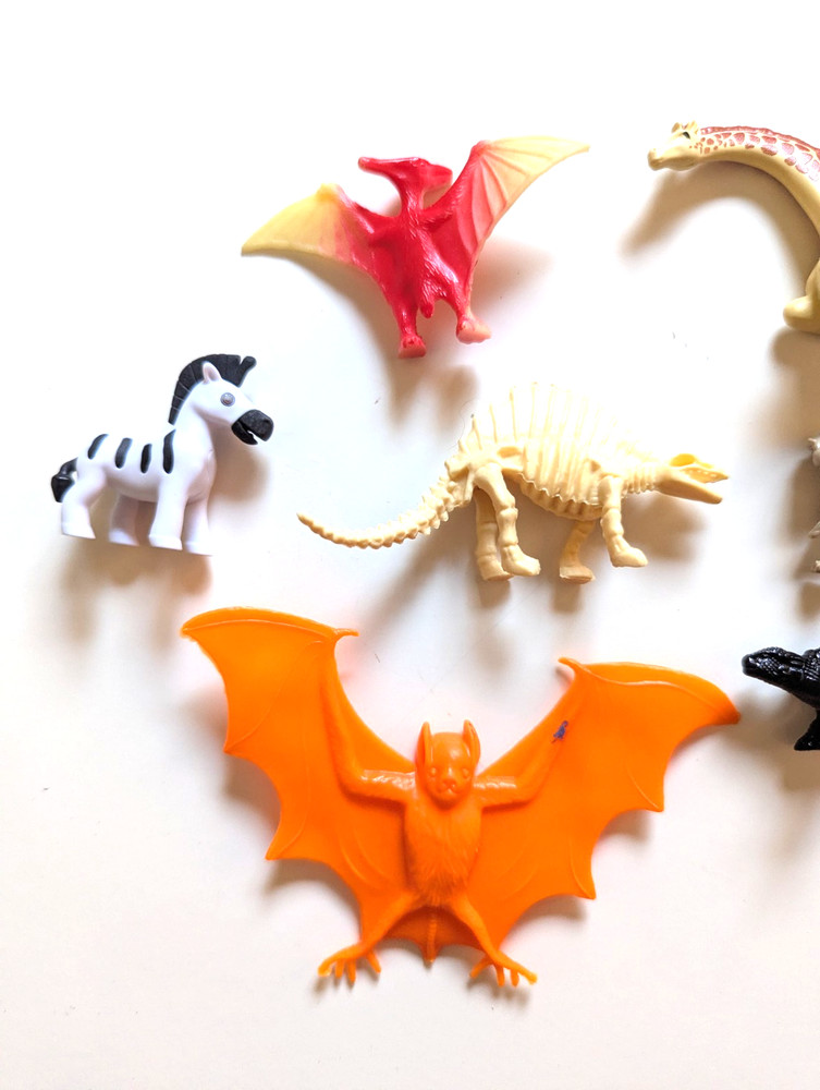 Dinosaur Animals Plastic Bat Qty 9