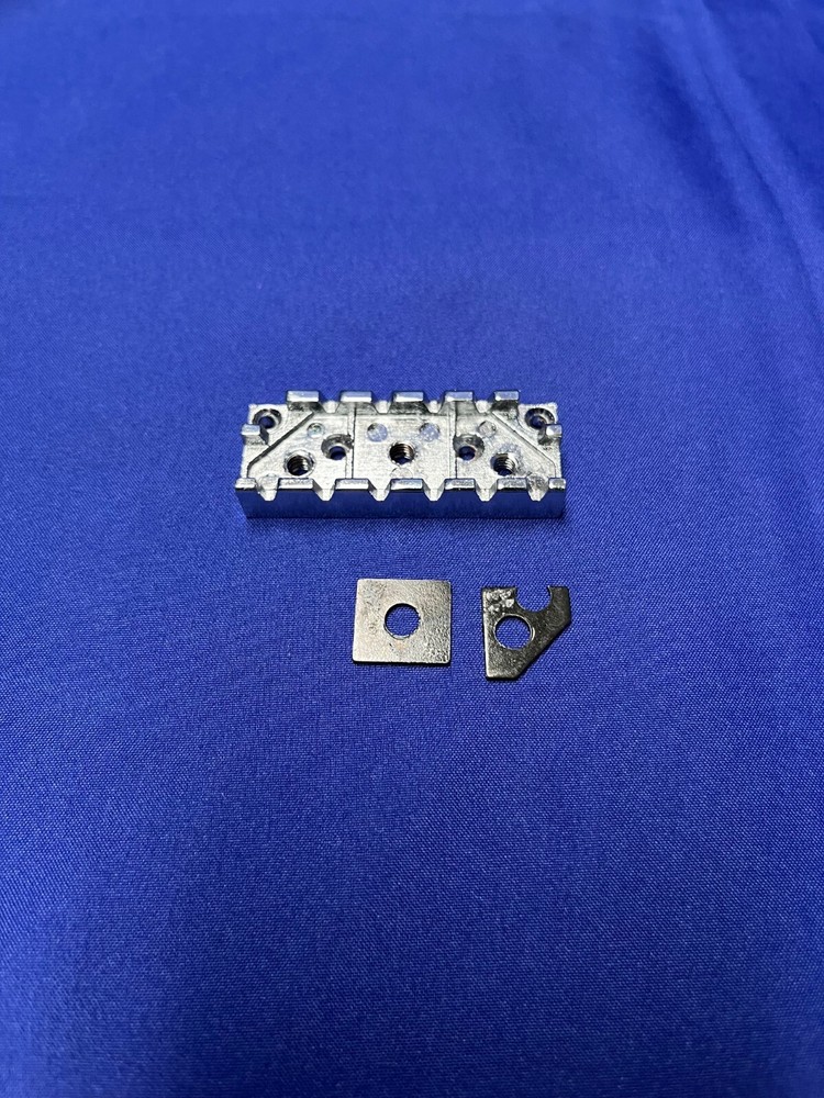 Locking Nut Wide Silver Base for an Electric Guitar