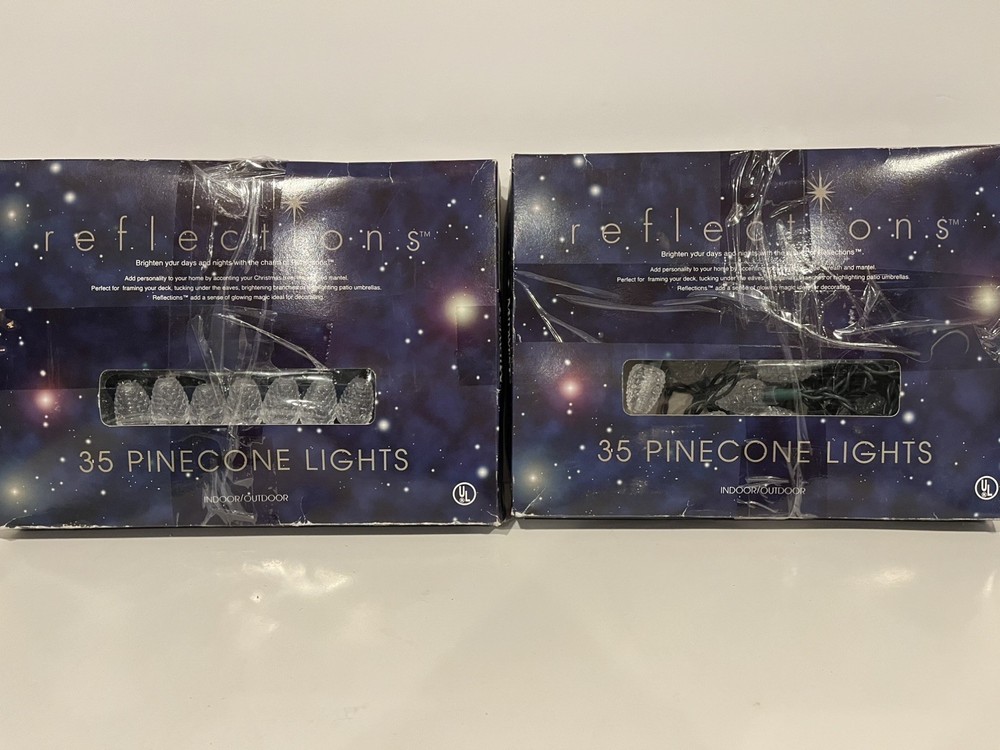 2 Sets of 35 Pinecone Christmas String Lights tested and working.