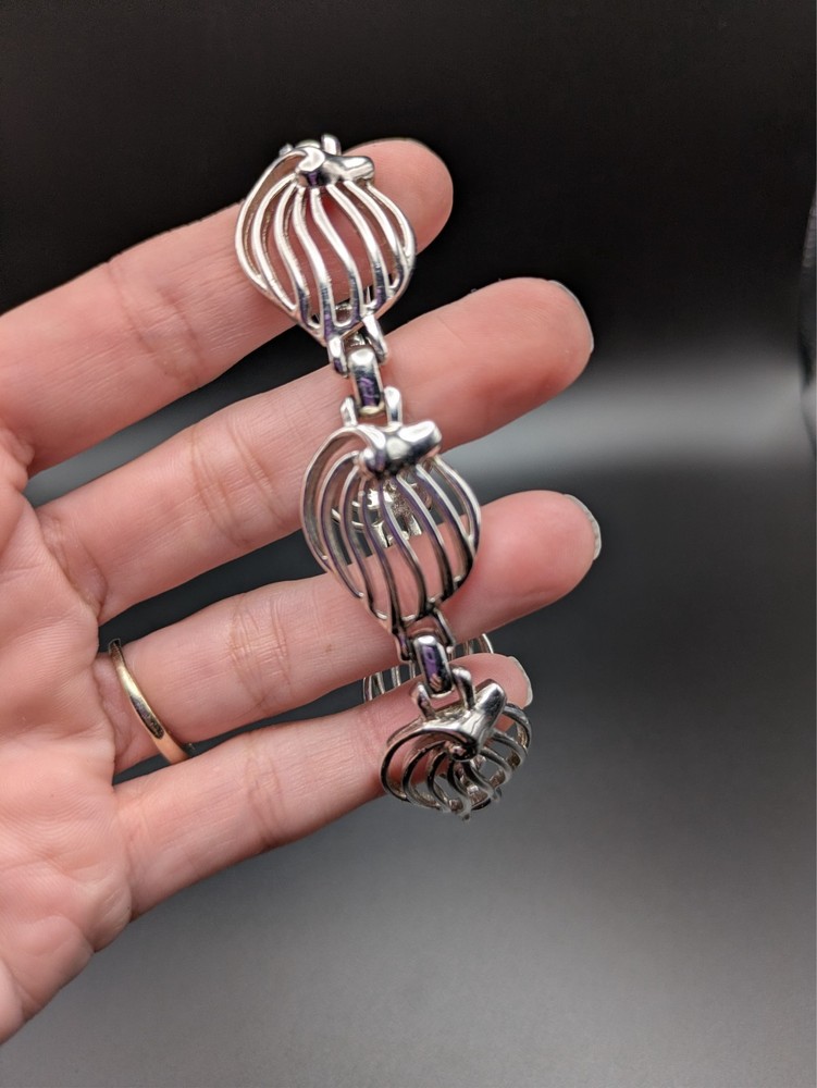 Silver-Toned Bracelet and Necklace Set Featuring Abstract Leaf Patterns