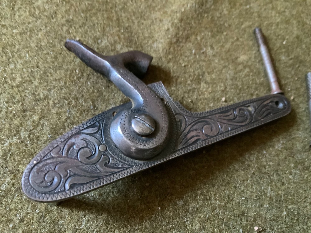 Percussion lock with screws