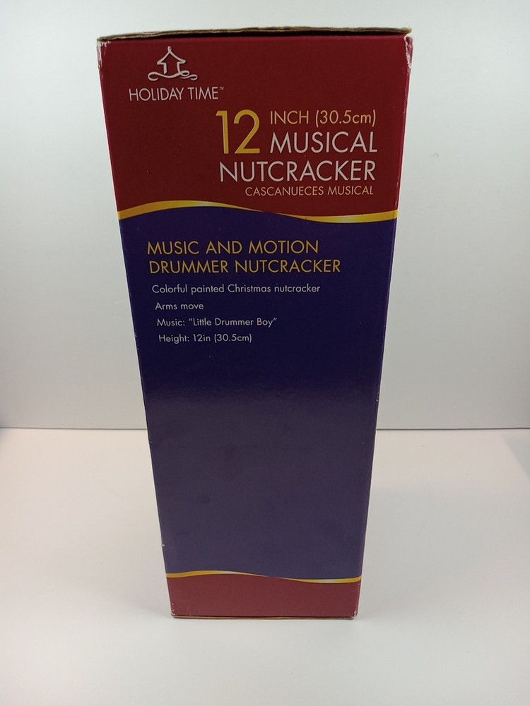 12" Musical Nutcracker. Music And Motion Twist Key.