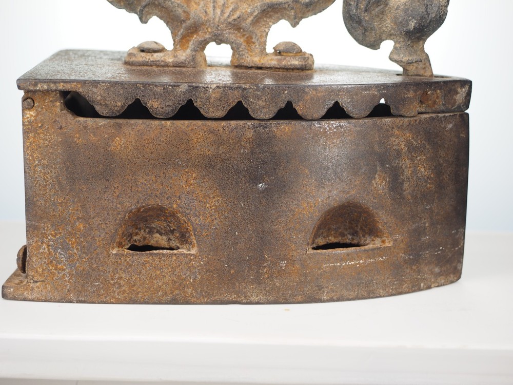 Antique cast iron coal fired clothing iron