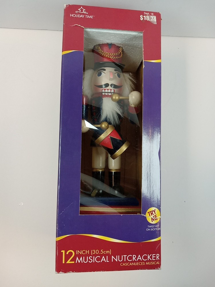 12" Musical Nutcracker. Music And Motion Twist Key.