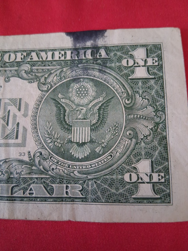 $1 Ink Smear Error with Bleed Through