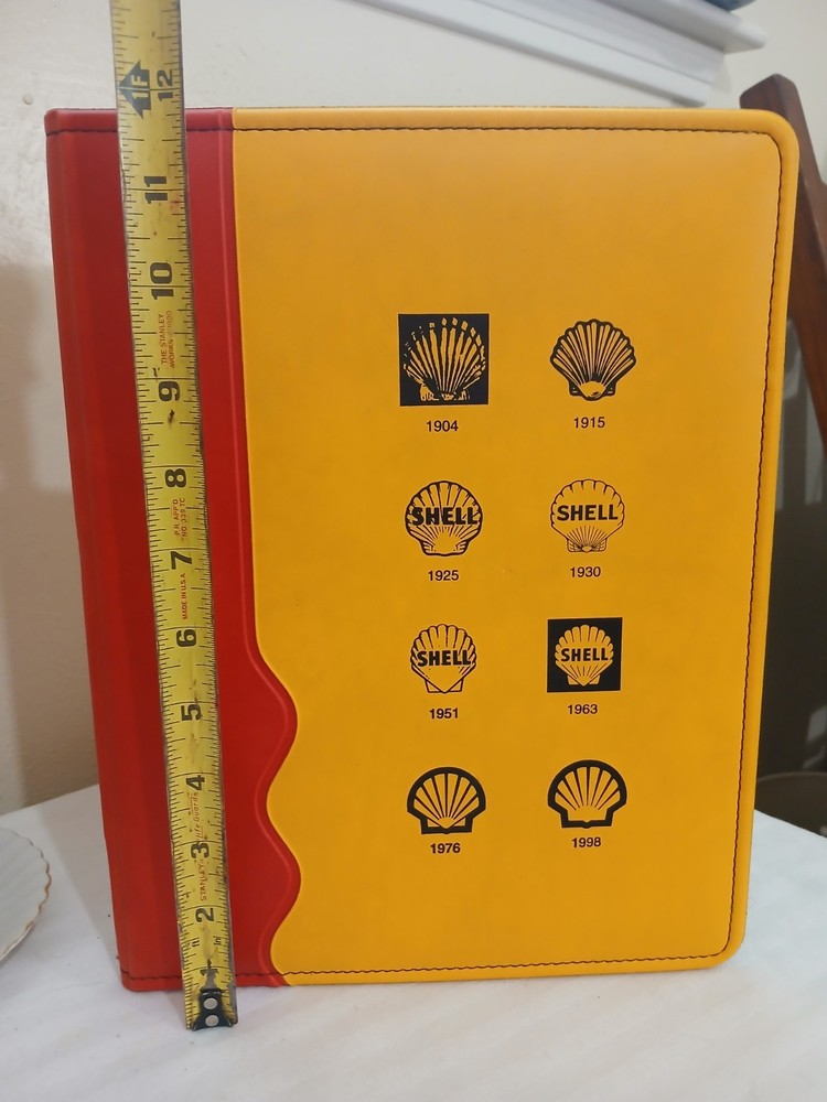 Decorative Binder featuring Historical Evolution Of the Shell Oil Logo