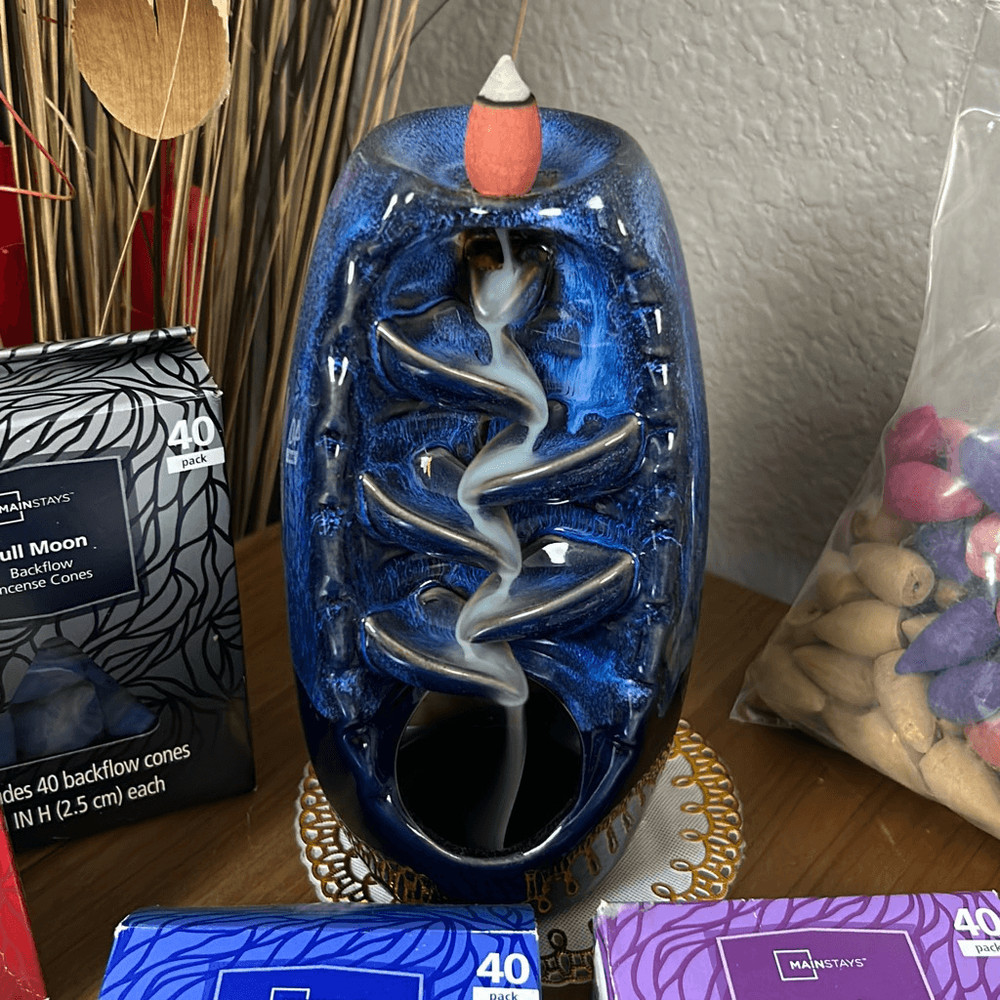 Incense burner with five packages of incense