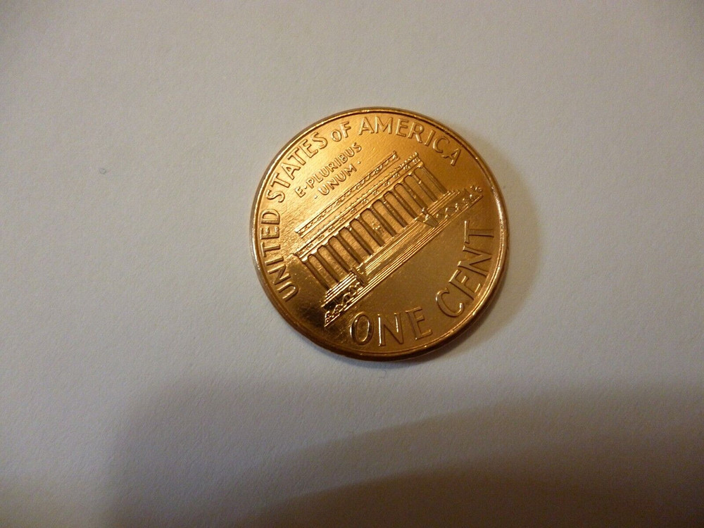 2000 penny, Floating roof coin