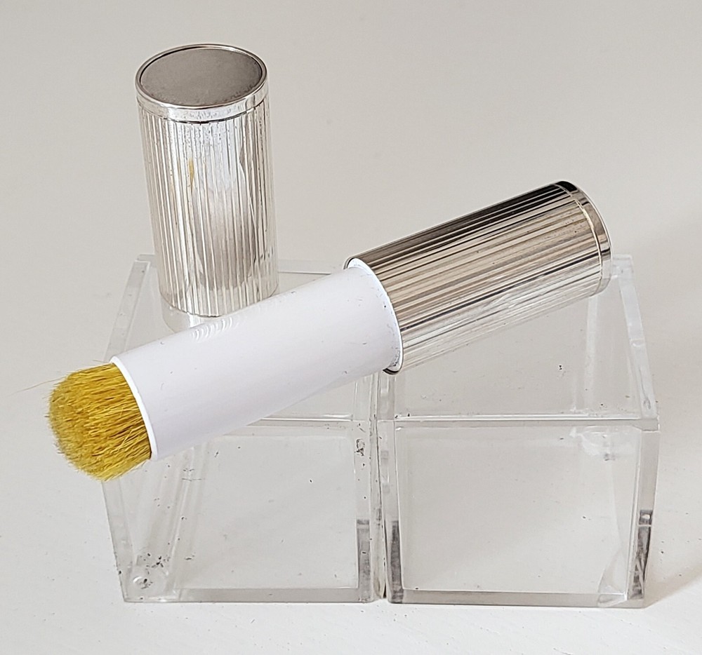 Perfume holder + makeup brush  