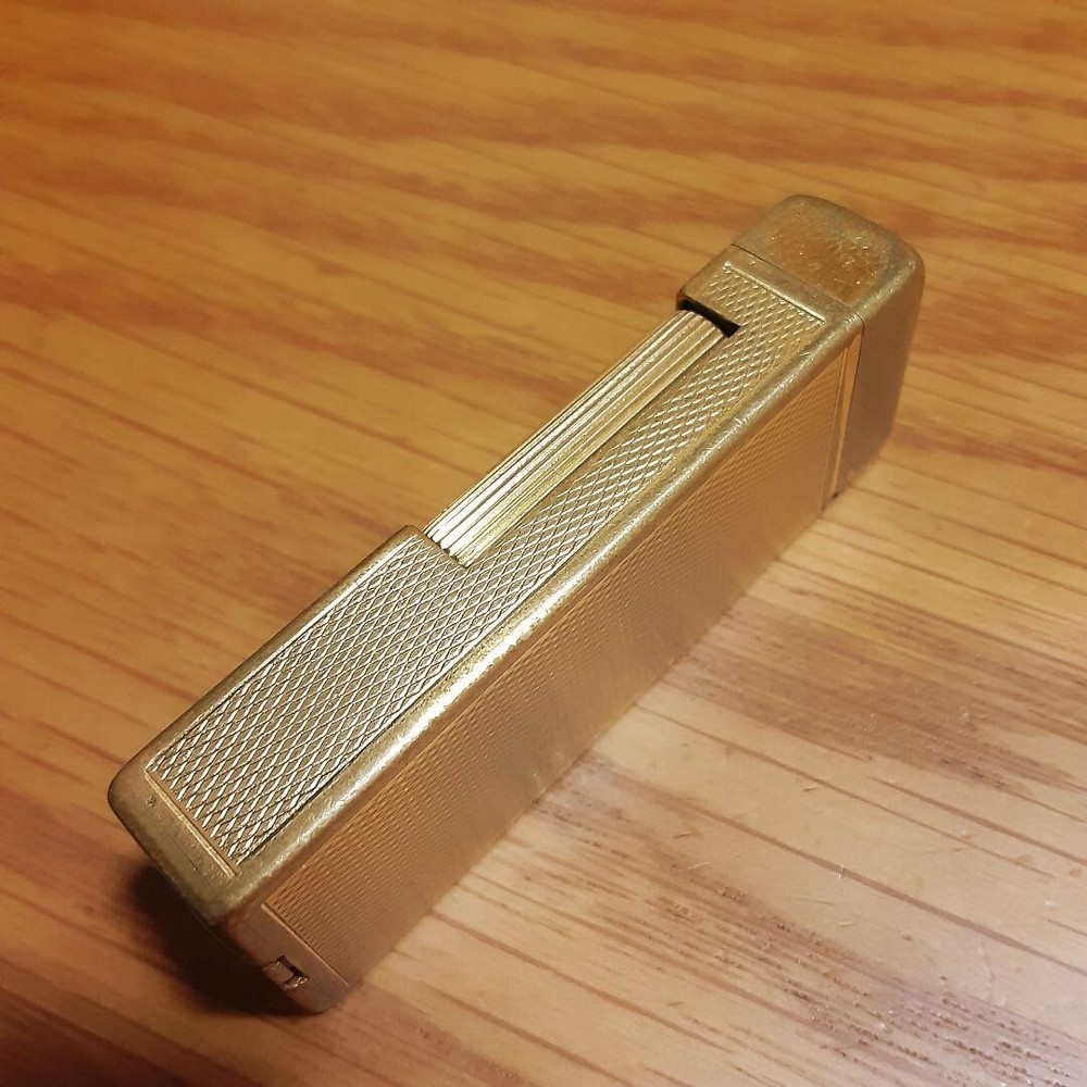 Working Dunhill oil lighter gold without box