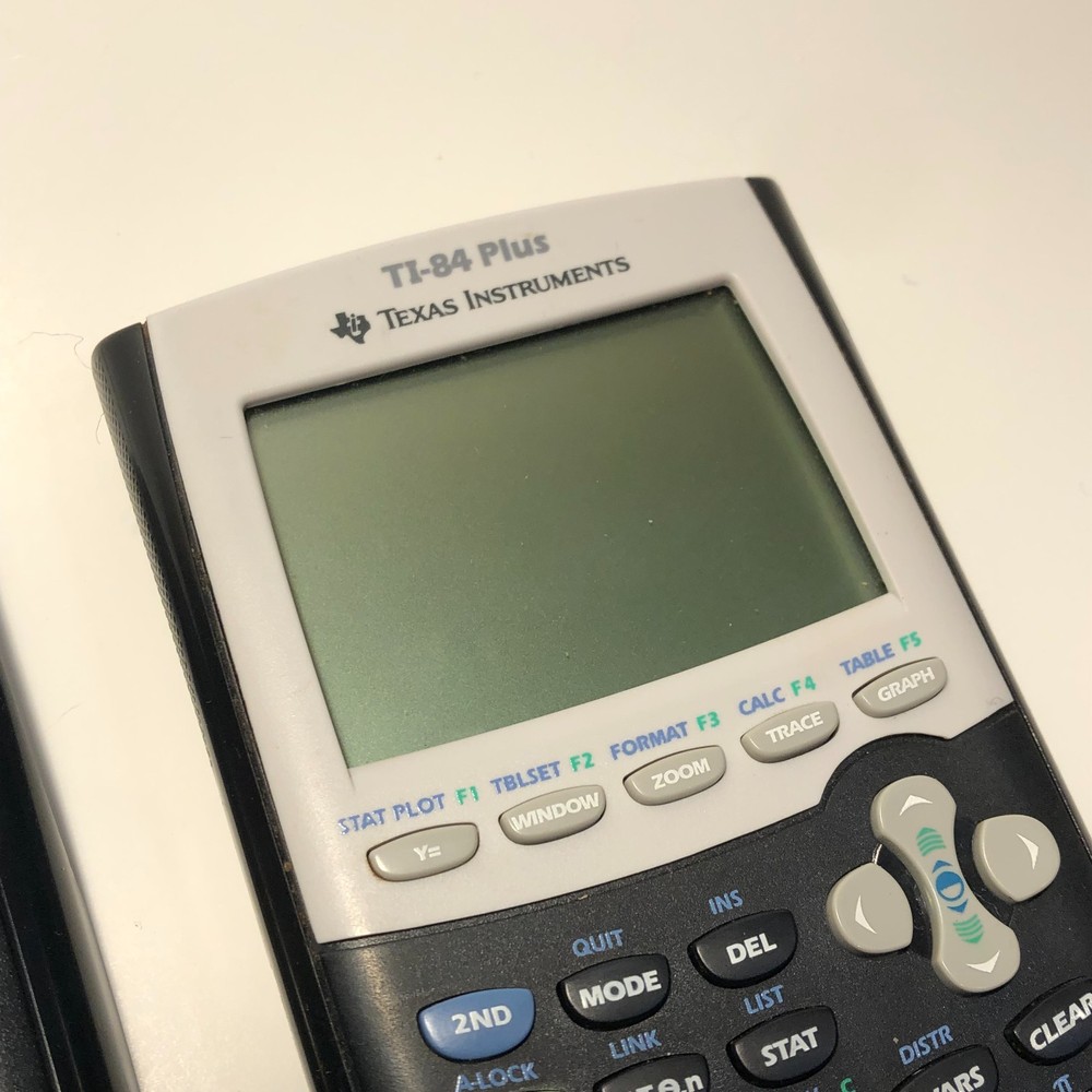 Texas Instruments TI‑84 Plus Graphing Calculator w/ Slide Cover Tested