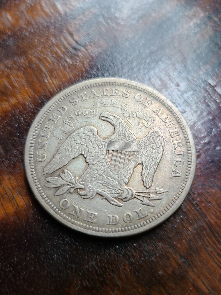 1870 Seated Liberty Dollar Fine