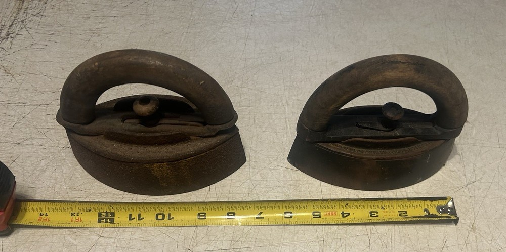 2 OLD SAD IRONS