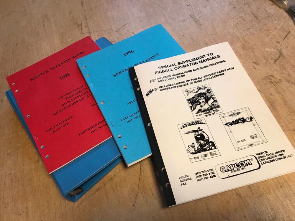 Capcom Service Bulletins Binder with Arcade Pinball game manuals, service, notes