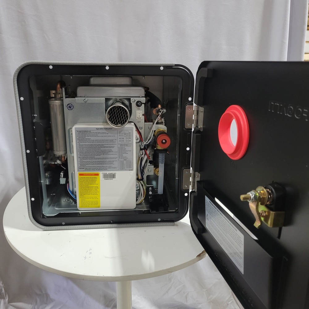 Used 66,000 BTU RV Tankless Water Heater 3.6 GPM InstaShower 9 Pro 15x15 Door