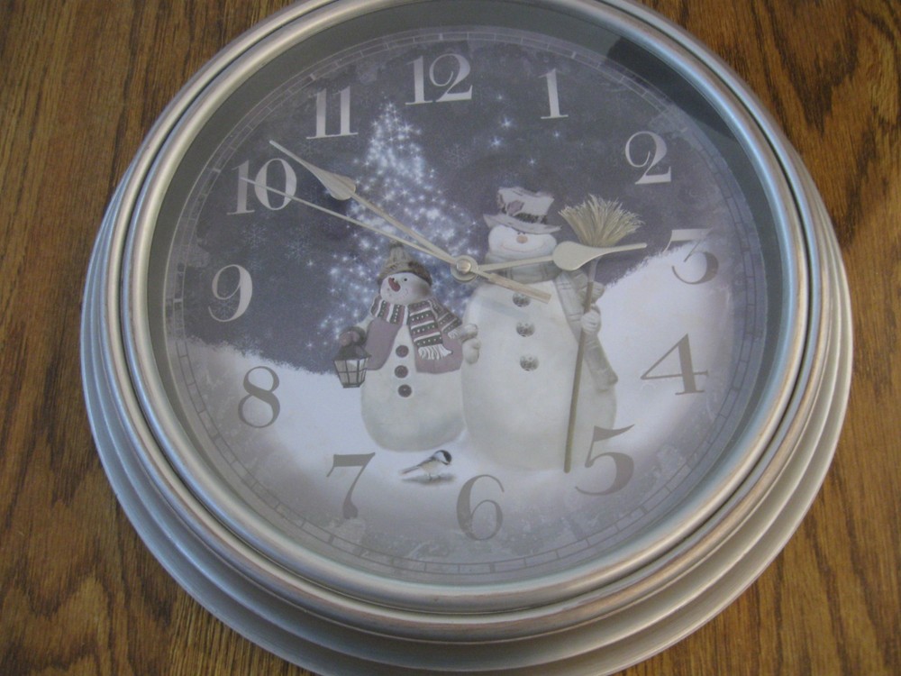 Battery operated snowman caroling clock