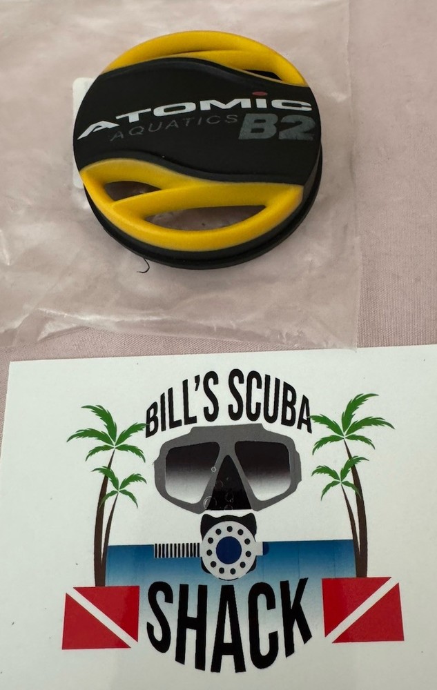 ATOMIC B2 REGULATOR PURGE COVER IN YELLOW NICE !