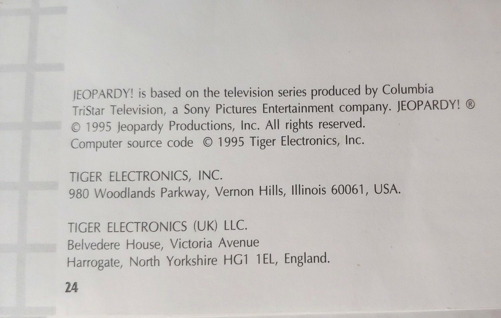 Jeopardy Handheld Electronic Game Complete with Answer/Question Book & Cartridge