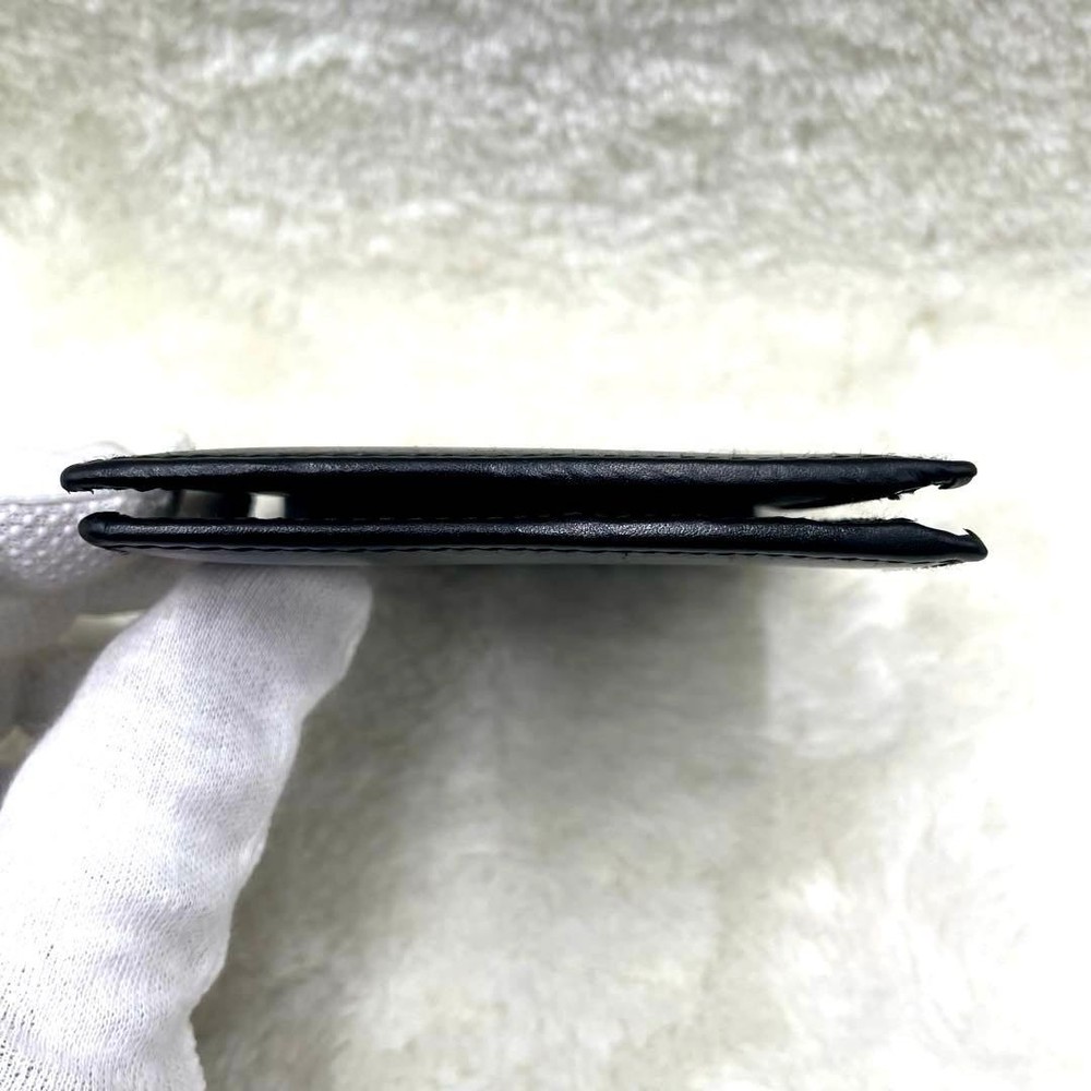 GUCCI Embossed Logo Black Folding Wallet