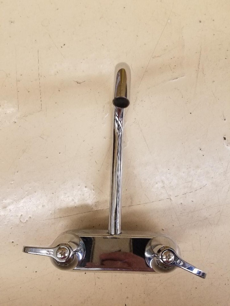 Bath cock with spout