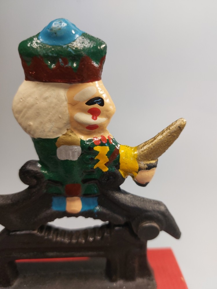 Cast Iron Painted Soldier Nut Cracker on wood base