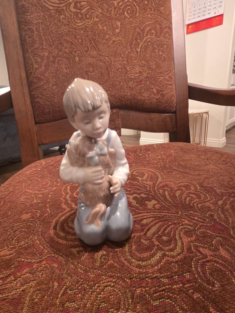 lladro figurine boy and dog 1990