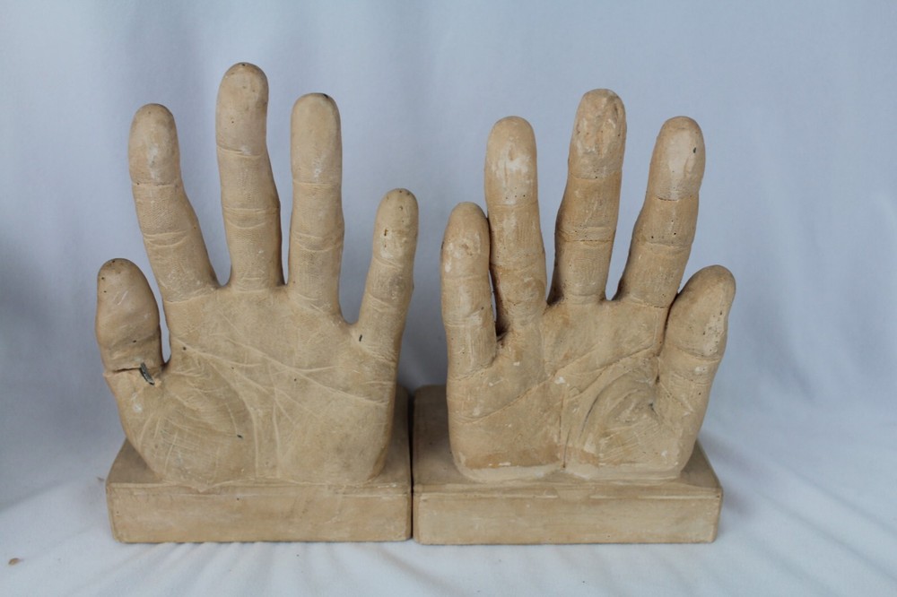 Plaster bookends Reading Hands